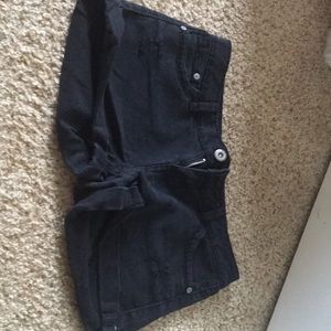 Distressed black shorts